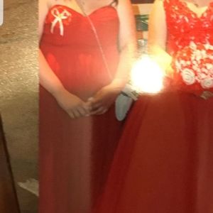 Plus size red dress on the left of the picture